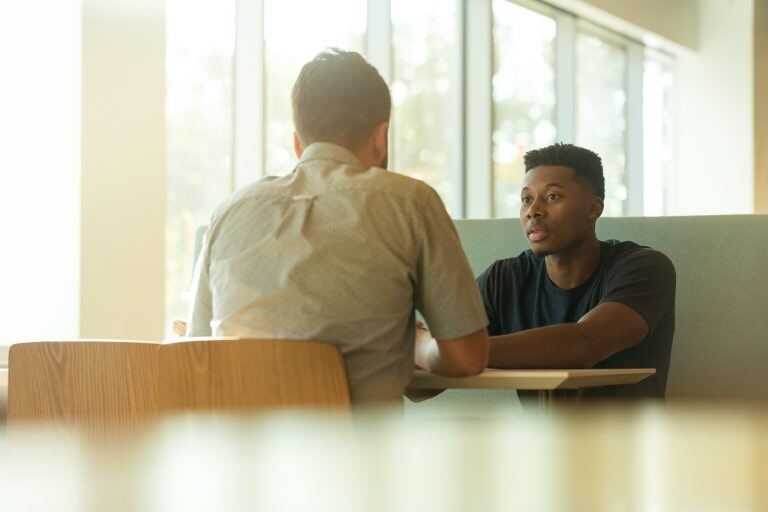 Two men at a table